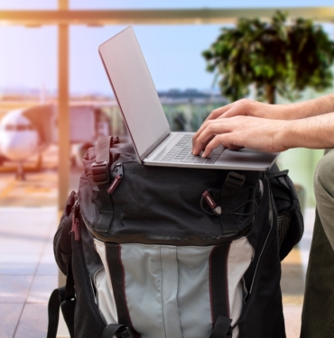 Cropped,Shot,Of,An,Unrecognizable,Digital,Nomad,Sitting,Alone,And